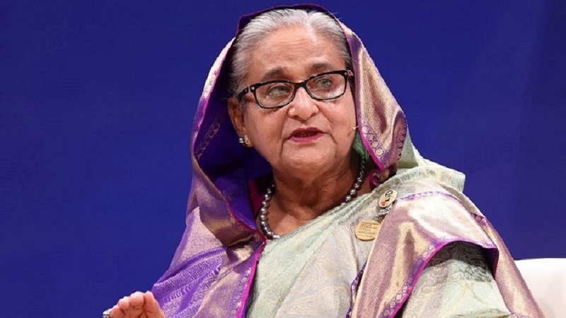 ডিসেম্বরে দেশে ফিরে আত্মসমর্পণ করবো: রয়টার্সকে শেখ হাসিনা